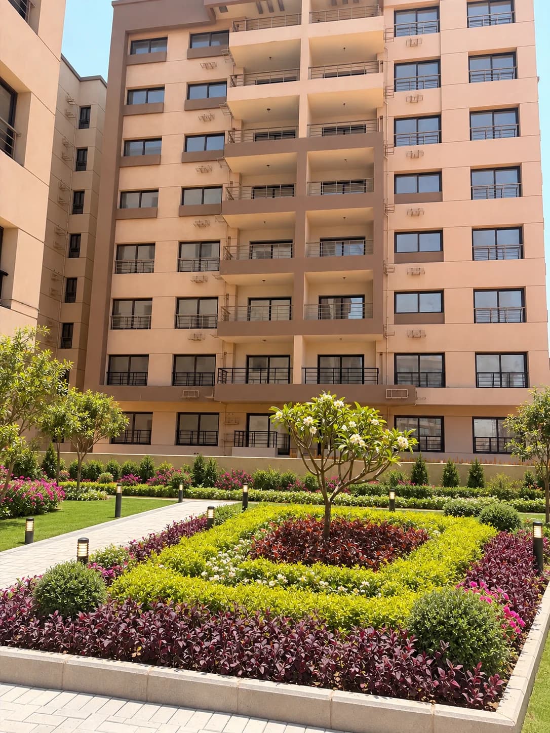 Architectural view of premium residential facades surrounded by open green spaces.